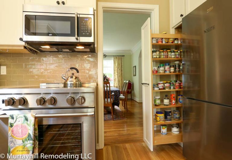 Kitchen renovation with stainless appliances and tile backsplash in Portland, OR